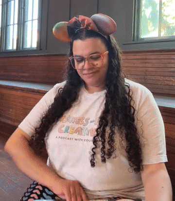 Colie James, systems expert, opens up laptop.